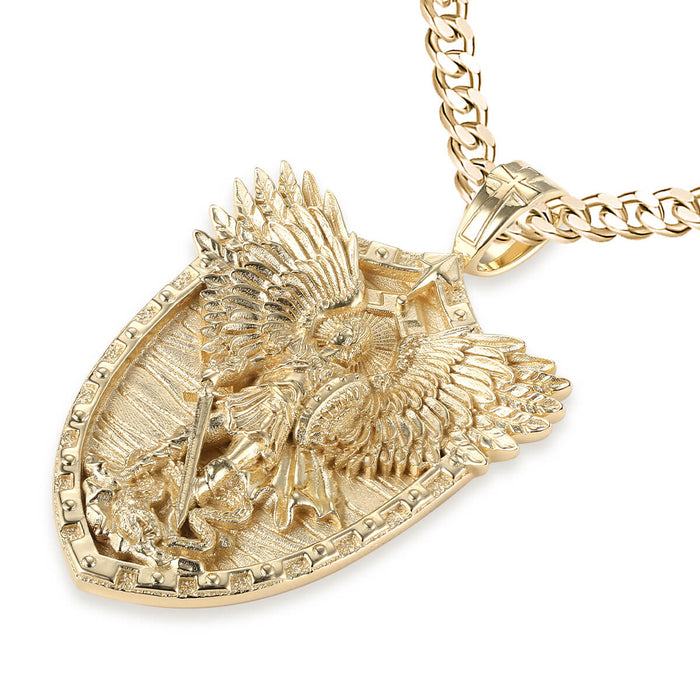 Gold pendant with intricate design on a white background