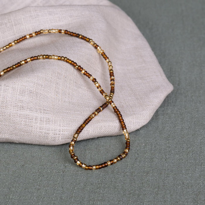 brown sugar waist beads – handmade Ghanaian body jewelry by Tòma Lina