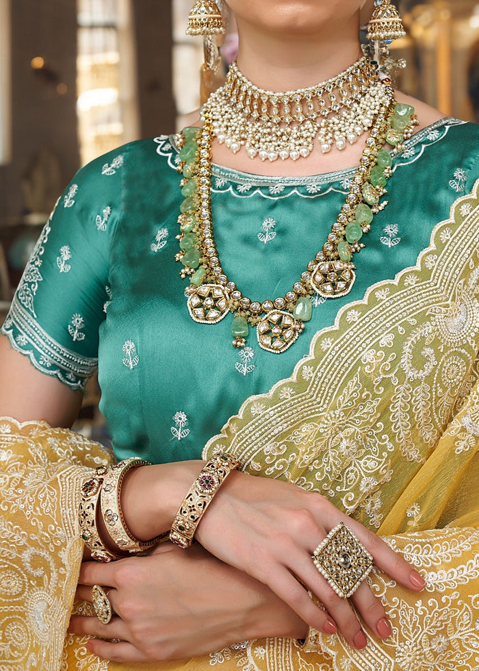 Cadium Yellow Fancy Tissue Saree With Unique Work And Designer Blouse - qivii