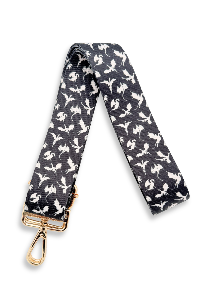 Black dragon-patterned strap with gold clasp on a white background