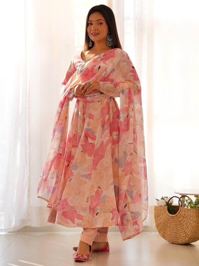 Dazzling Peach Floral Printed Georgette Traditional Anarkali Suit with intricate embroidery and flowing silhouette