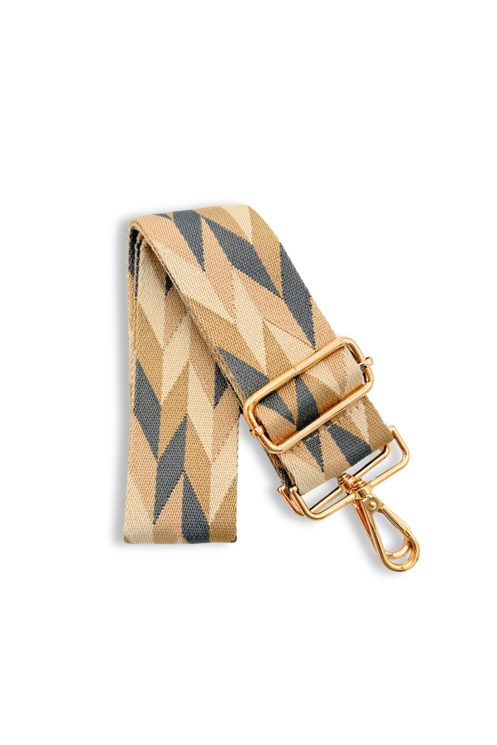 Beige and gray striped bag strap with gold buckle on a white background