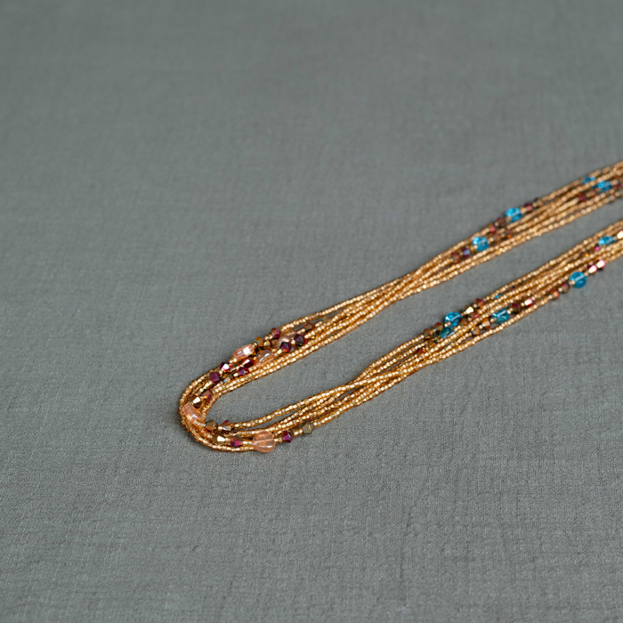 Golden Bliss waist beads in gold - handmade Ghanaian body jewelry by Tòma Lina