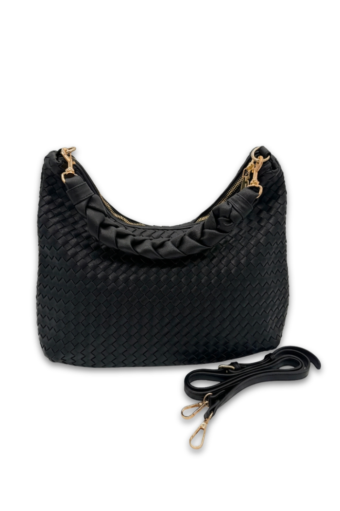 Black woven handbag with a strap on a white background