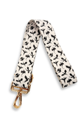 Bag strap with black dragon pattern on a white background