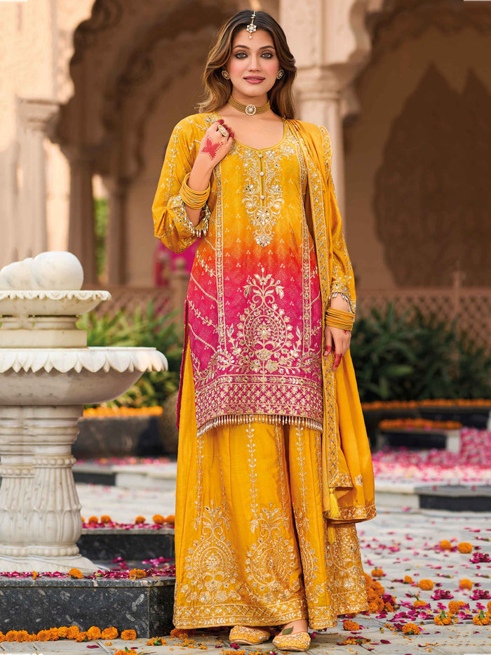 Luxurious yellow palazzo trousers with intricate embroidery