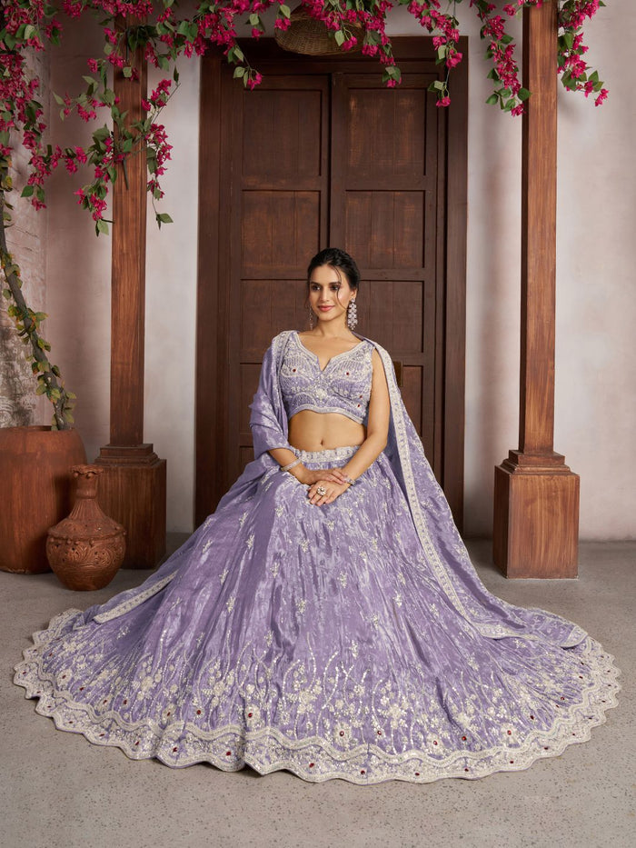 Luxurious Purple Banarasi Tissue Lehenga Adorned with Bead Embellishments
