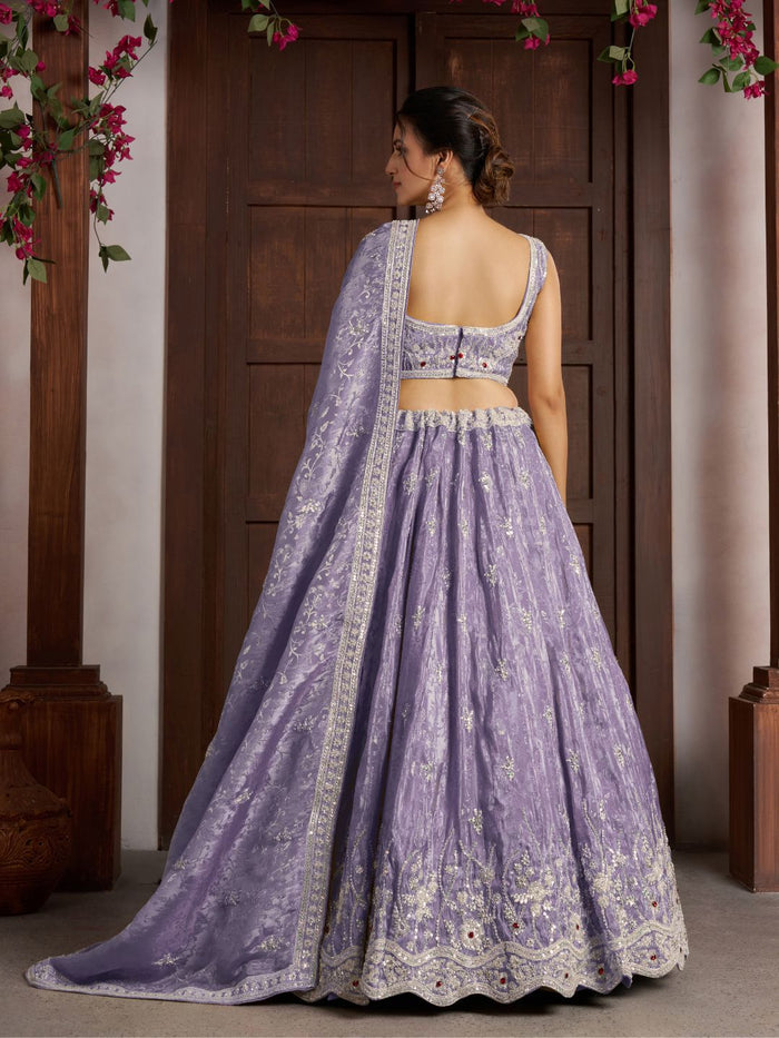 Luxurious Purple Banarasi Tissue Lehenga Adorned with Bead Embellishments