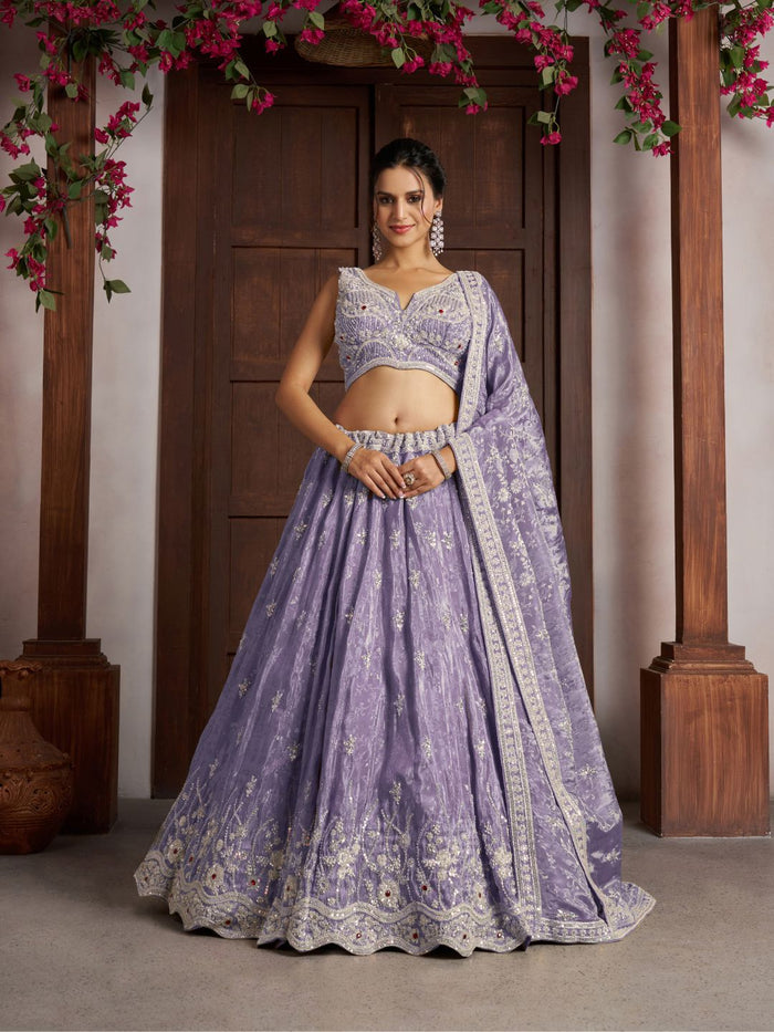 Luxurious Purple Banarasi Tissue Lehenga Adorned with Bead Embellishments