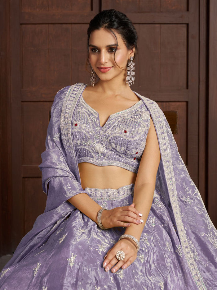 Luxurious Purple Banarasi Tissue Lehenga Adorned with Bead Embellishments