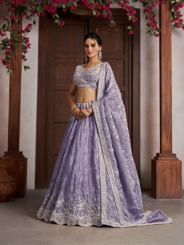 Luxurious Purple Banarasi Tissue Lehenga Adorned with Bead Embellishments