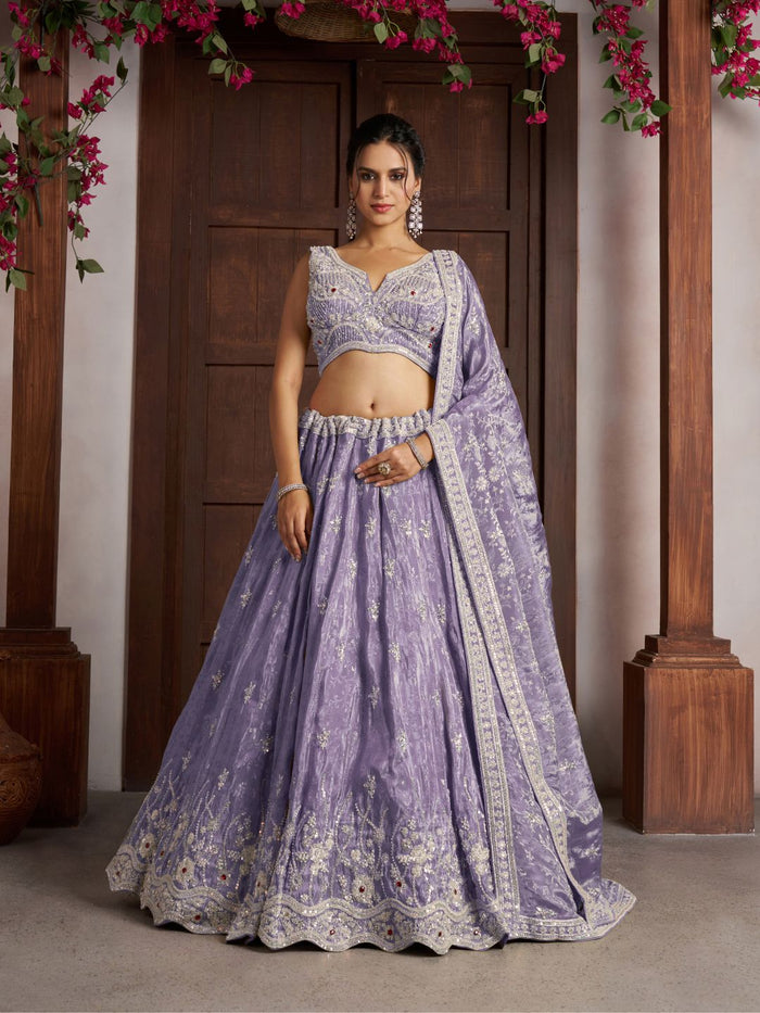 Luxurious Purple Banarasi Tissue Lehenga Adorned with Bead Embellishments