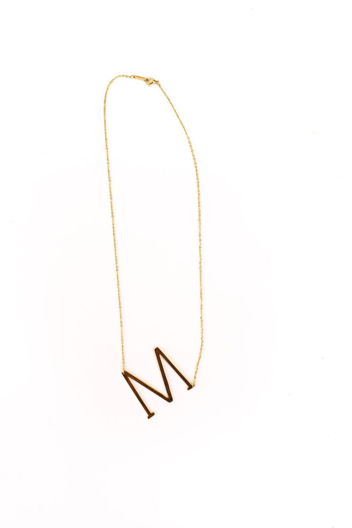 M / Gold
