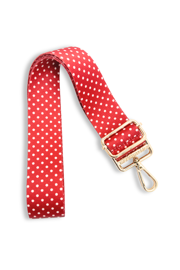 Modern + Chic red and white Polka Dot Adjustable Purse and Bag Strap on a white background.