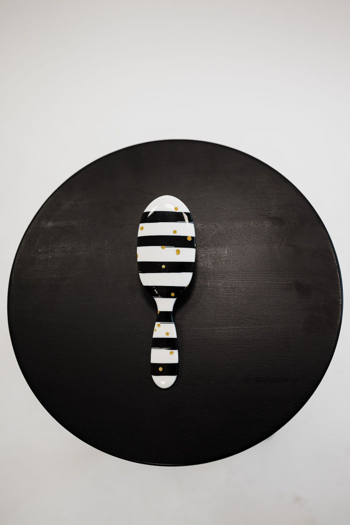 black + white stripes with gold dots