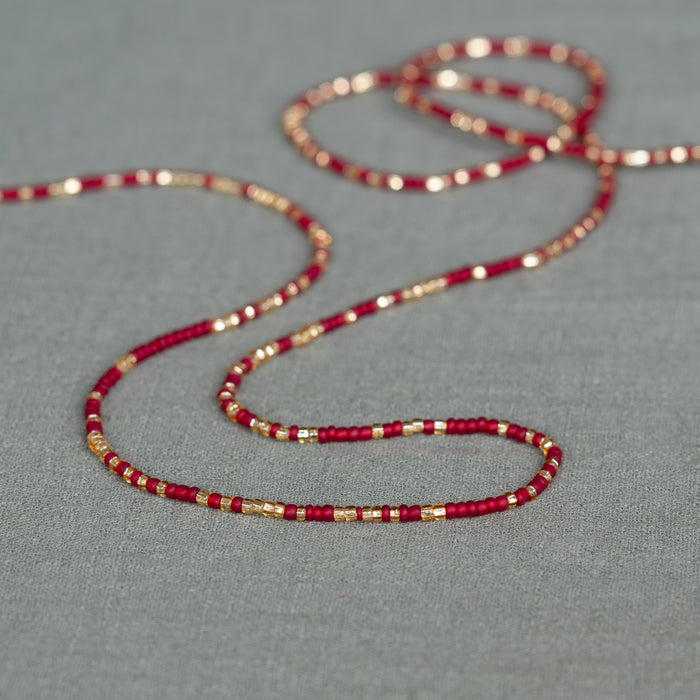 Soft red waist beads – handmade Ghanaian body jewelry by Tòma Lina