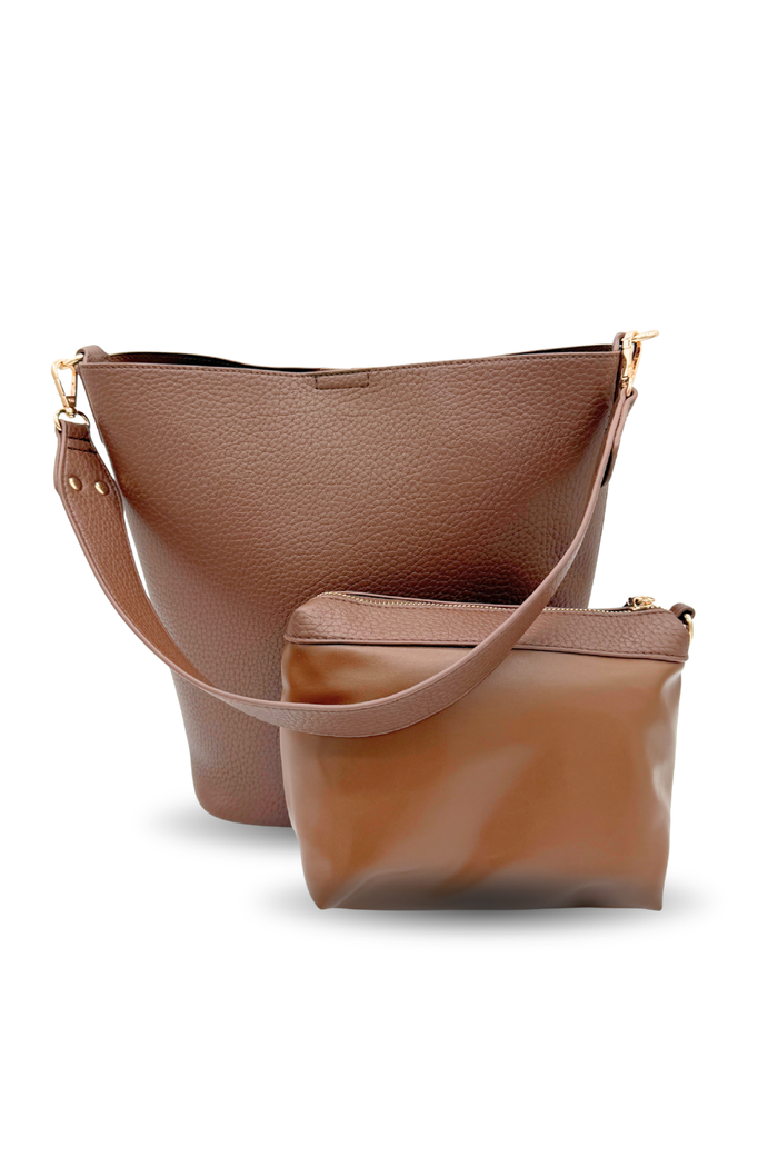 A brown Modern+Chic vegan leather Sophie Bucket Bag and coordinating zipper pouch for Women –  on a white background.